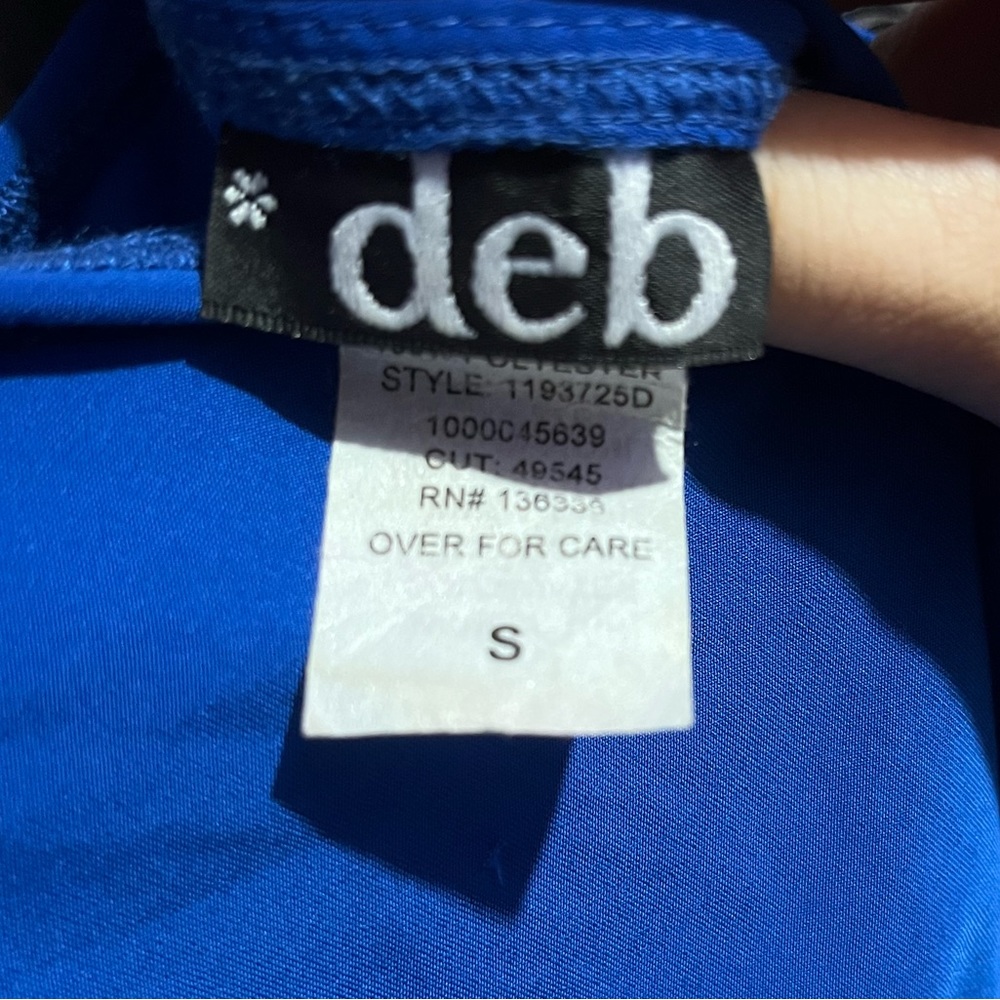 Short, silky blue dress, one sleeve, shoulder gem